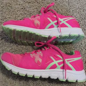 Girls ASICS tennis shoes.